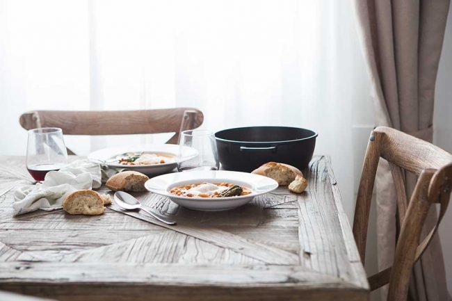 rustic set table with fresh hot meal